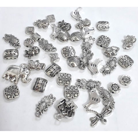 50gam charm xỏ & mặt con thú-M3