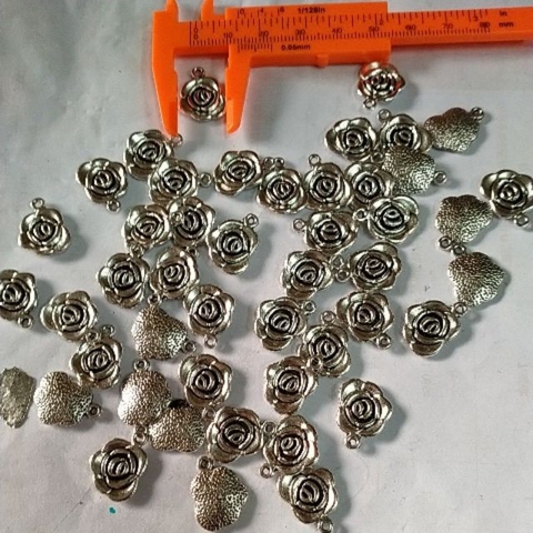 Gói 10-50gam Mặt hoa hồng 23x16mm-mh5881