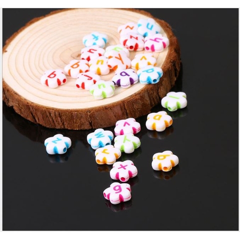 gói 10-50gam hạt nhưa cánh hoa in chữ cái màu