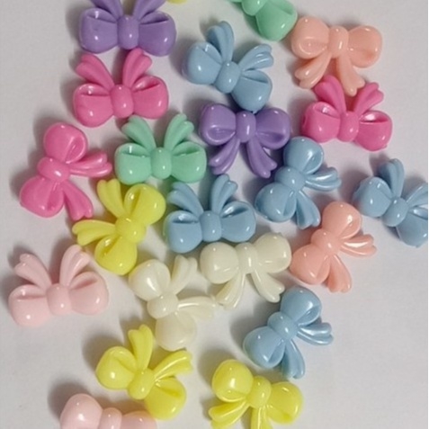 (#P117-29) 10-50gam hạt nhựa hình Nơ 12x17mm có lỗ