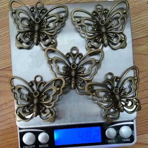 10/48gam mặt bướm 40x50mm màu đồng