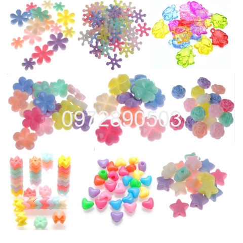 100gam hạt nhựa nhiều kiểu :hoa, ngôi sao, trái tim... các kiểu có lỗ xỏ để làm vòng hạt, làm thủ công, đồ  chơi