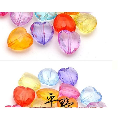 #P117-35 gói 10-50gam hạt nhựa trái tim 12/15mm màu trong