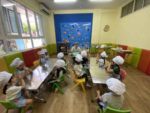 The Kinder Captains had a fantastic kitchen adventure with Mr. Quoc Anh, the school chef.