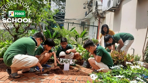 The Grade 5 students: Hands in the soil; hearts in earth's gifts; minds full of hope. 