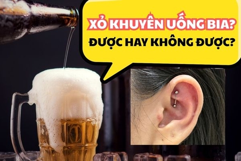 Xỏ khuyên uống bia được không? Sự thật & rủi ro bạn cần biết