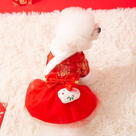 Váy Tết lót lông đính nơ và túi thỏ