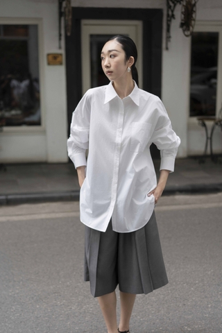 PLEATED BERMUDA SHORTS