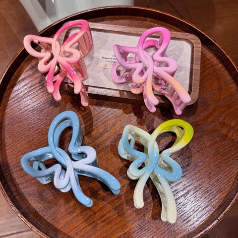 Kẹp càng cua bướm nơ màu loang 10k