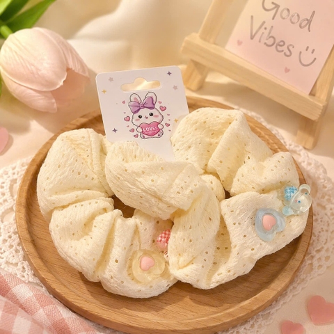 Set 2 scrunchies ren lỗ charm Sanrio