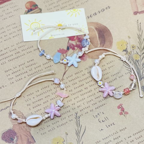 Vòng tay vibe biển charm sứa gốm