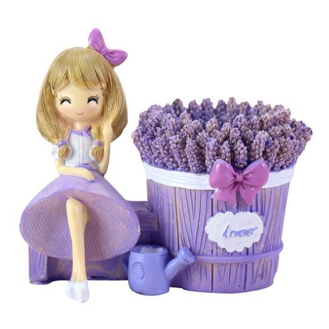 Ống cắm bút cô gái