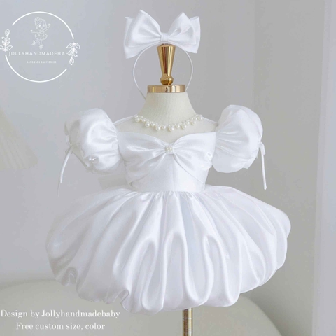 White satin baby girl princess dress with puff sleeves, pearl neckline and bow bodice, handmade toddler party dress with matching headband.
