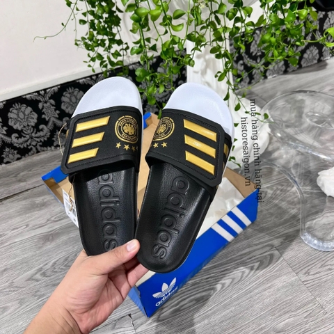 1007 -  Dép Adidas Adilette TND Germany Core Black / Tactile Gold Metallic - Code GX9706 [HÀNG CHÍNH HÃNG]