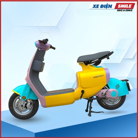 Xe máy điện Dibao Keva màu  vàng xanh