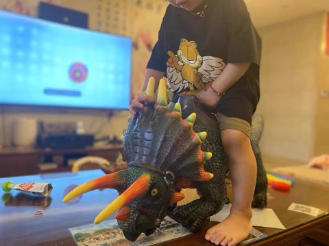 Đồ chơi mô hình khủng long trẻ em cỡ siêu lớn phát nhạc có đai yên để bé ngồi cưỡi