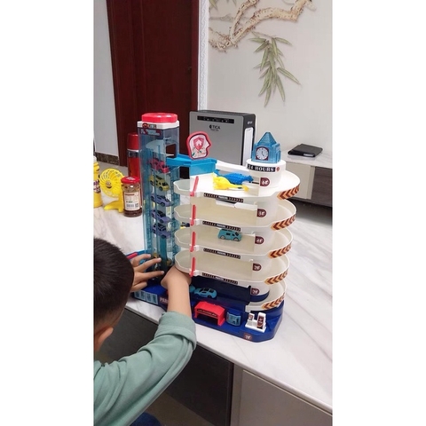 Full Bộ Đồ Chơi Đường Đua Khủng Long Siêu Tốc Kết Hợp Garage 5 Tầng Cho bé