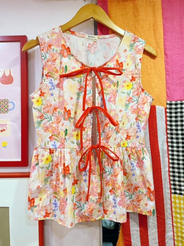 Áo không tay cột nơ hồng Líu Lô