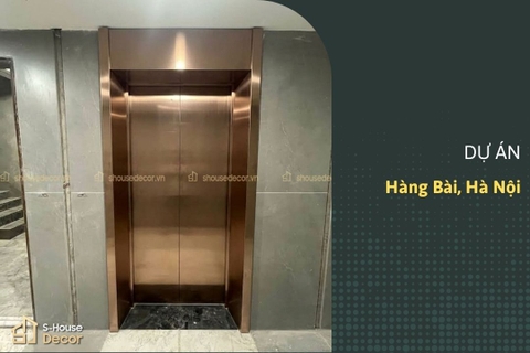 Ốp inox khung bao bản rộng thang máy tại Hàng Bài– Inox 304 xước vàng hồng sang trọng