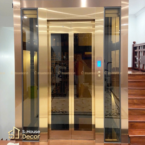 TRANG TRÍ THANG MÁY CAO CẤP VỚI ỐP INOX KHUNG THÉP THANG MÁY NHẬP KHẨU