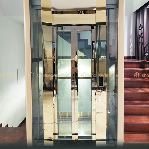 Ốp Inox Vàng Cho Thang Máy Kính Mẫu OTMKV05