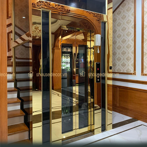 Ốp Inox Vàng Cho Thang Máy Kính Mẫu OTMKV09