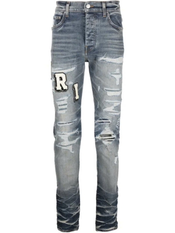 AMIRI Varsity ripped skinny jeans