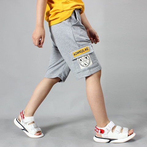 Quần short bé trai cotton thoáng khí phối túi hộp kiểu dáng thể thao
