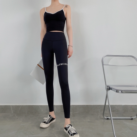 Quần legging nữ dài chín tấc ôm dáng co giãn, in chữ trên đùi thời trang