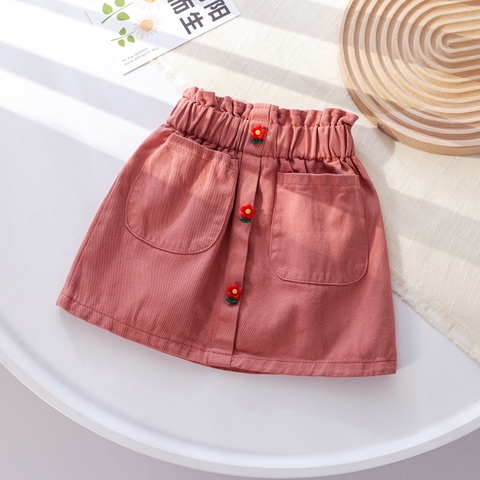 Váy jean ngắn thiết kế túi và phối hoa hợp thời trang dành cho bé gái