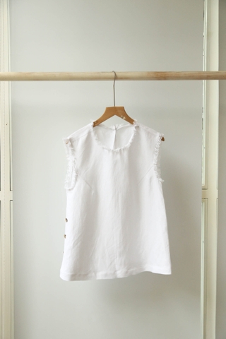 Áo Xavia sát nách tua rua