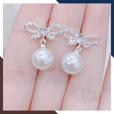 ​​​​​​​Bông tai ngọc trai thật dáng tòn ten, mẫu bông tai hình nơ bạc đính ngọc trai đẹp dễ thương cho nữ mã K65TT78