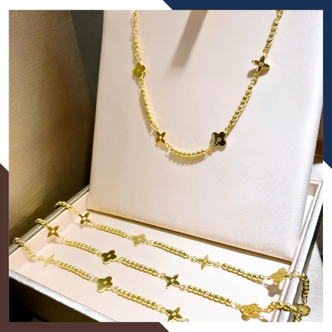 Lắc chân bi vàng 10k phối hoa 4 cánh đẹp cho nữ mã TL150