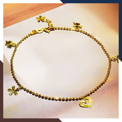 Lắc chân bi vàng tây nữ 10k mix charm trái tim và cỏ 4 lá mã TL86