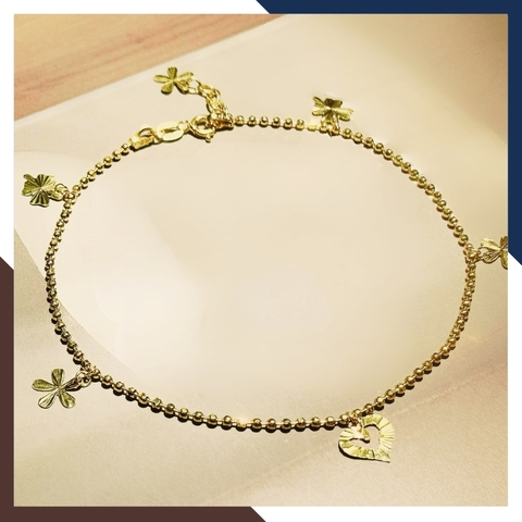 Lắc chân bi vàng tây nữ 10k mix charm trái tim và cỏ 4 lá mã TL86