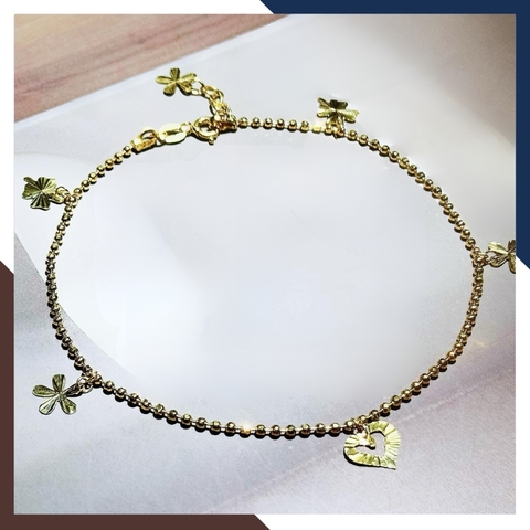 Lắc chân bi vàng tây nữ 10k mix charm trái tim và cỏ 4 lá mã TL86