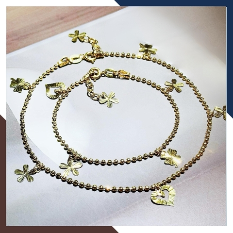 Lắc chân bi vàng tây nữ 10k mix charm trái tim và cỏ 4 lá mã TL86