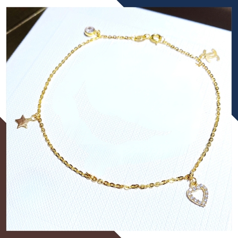 Lắc chân vàng tây nữ 10k mix charm chanel, trái tim, ngôi sao và ổ đá mã TL54