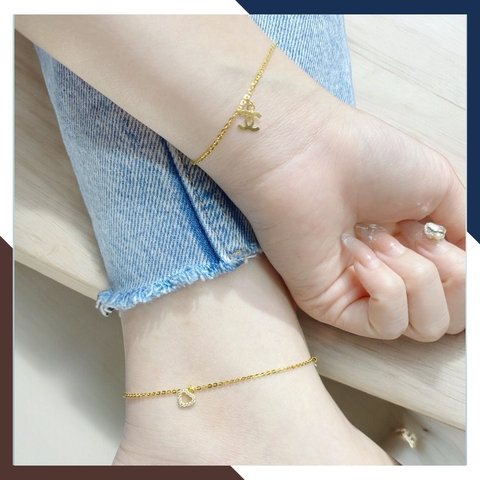 Lắc chân vàng tây nữ 10k mix charm chanel, trái tim, ngôi sao và ổ đá mã TL54