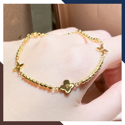 Lắc tay bi vàng tây 10k mix charm hoa 4 cánh cho nữ đẹp mã TL107