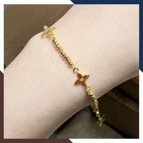 Lắc tay bi vàng tây 10k mix charm hoa 4 cánh cho nữ đẹp mã TL107