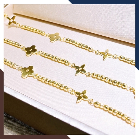Lắc tay bi vàng tây 10k mix charm hoa 4 cánh cho nữ đẹp mã TL107
