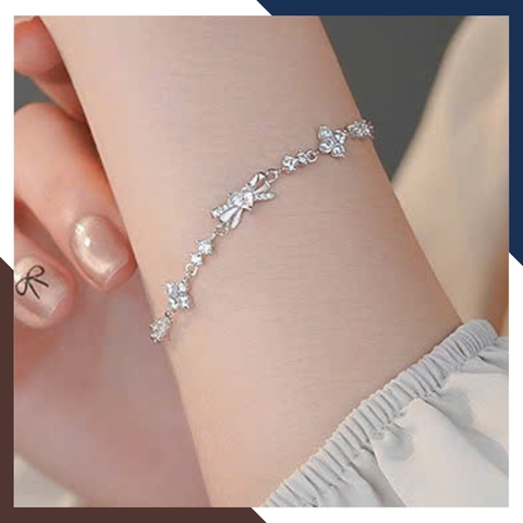 Lắc Tay Cỏ 4 Lá Phối Nơ Bạc Ta Nguyên Chất LTBN48 – Điểm Nhấn Duyên Dáng Cho Phái Đẹp
