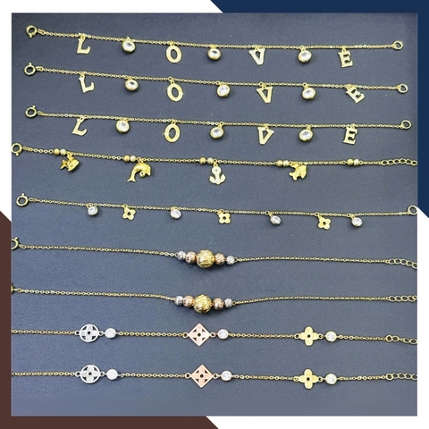 Lắc Tay Vàng Nữ 10K LTVN358 – Mix Charm Cá Heo, Cỏ 4 Lá & Bi Vàng 3 Màu Thanh Lịch