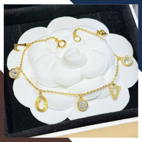 Lắc Tay Vàng Nữ 10K LTVN358 – Mix Charm Cá Heo, Cỏ 4 Lá & Bi Vàng 3 Màu Thanh Lịch