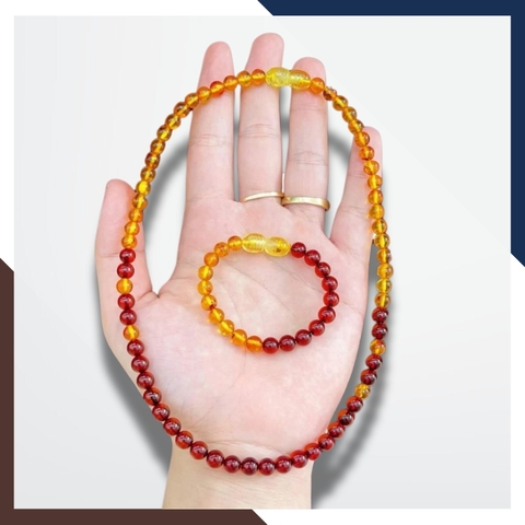 Set vòng cổ, vòng tay hổ phách cho bé mã AC260