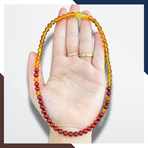 Set vòng cổ, vòng tay hổ phách cho bé mã AC260