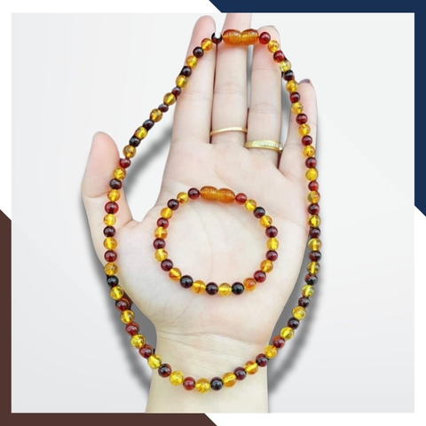 Set vòng cổ, vòng tay hổ phách cho bé mã AC260