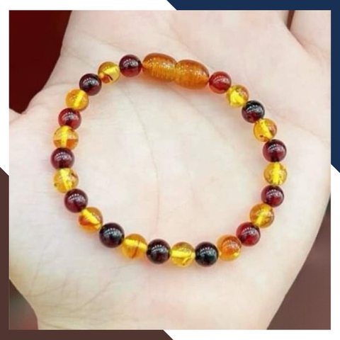 Set vòng cổ, vòng tay hổ phách cho bé mã AC260