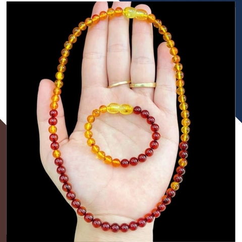 Set vòng cổ, vòng tay hổ phách cho bé mã AC260